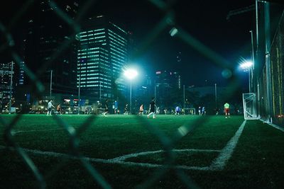 View of illuminated city at night