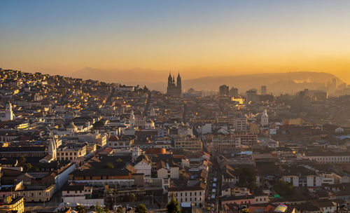 High angle view of city against sky during sunrise quito 