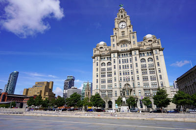 Liverpool, uk - july 14, 2022 liverpool cityscape with royal liver building, england, uk