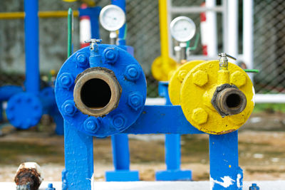 Close-up of fire hydrant against blue sky