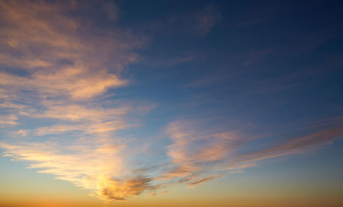 Low angle view of dramatic sky during sunset