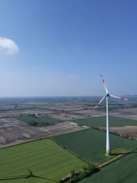 Scenic view of farm against sky