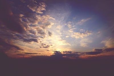 Scenic view of cloudy sky at sunset