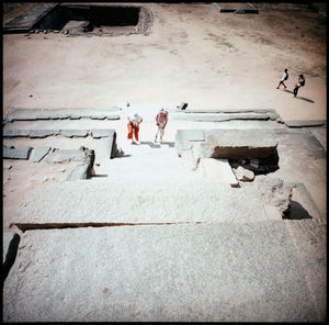 High angle view of people walking on staircase