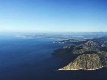 High angle view of sea against blue sky