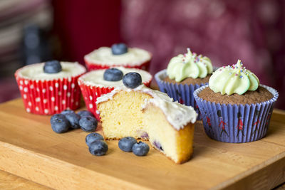 Close-up of cupcakes on cutting board