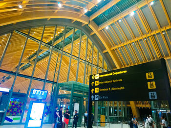 Low angle view of people at airport