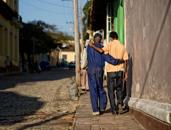 Men standing on street