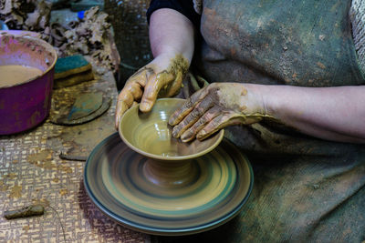 Woman working in mud