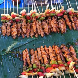 High angle view of meat on barbecue grill