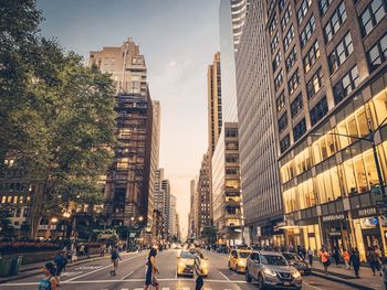 Panoramic view of city street and buildings