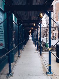 Empty walkway leading to building