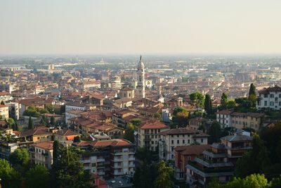 High angle shot of townscape against clear sky