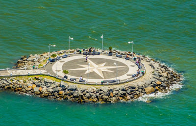 High angle view of people on the sea