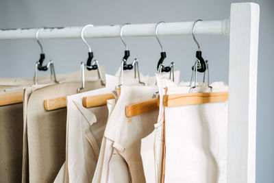 Close-up of clothes hanging on rack