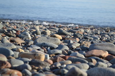 Close-up of pebbles on beach