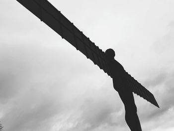 Low angle view of statue against sky