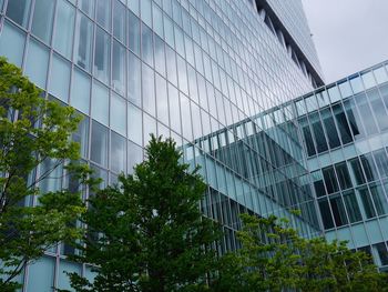 Low angle view of modern building against sky