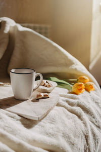 Close-up of coffee cup on table