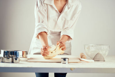 Midsection of woman holding ice cream