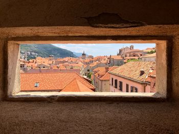 Houses in town seen window