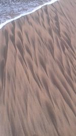 High angle view of sand at beach