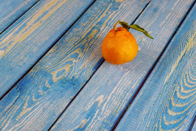 High angle view of orange on wood