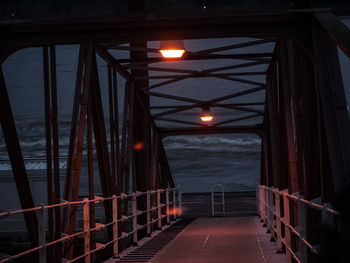 Bridge over river at dusk