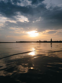 Scenic view of sea against sky during sunset