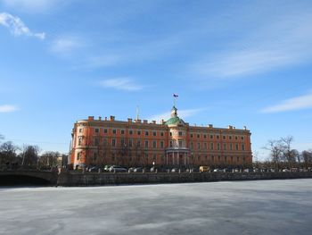 View of building against cloudy sky