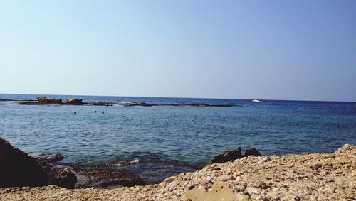 Scenic view of sea against clear sky