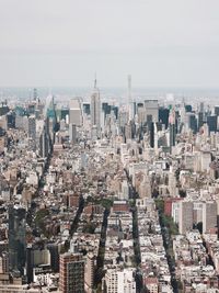 Aerial view of cityscape against clear sky