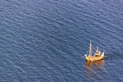 High angle view of boats sailing in sea against sky