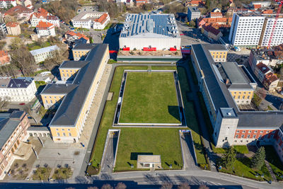 High angle view of road amidst buildings in city