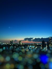 Illuminated cityscape at night