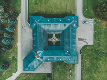 High angle view of swimming pool by building