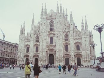 Tourists in front of church