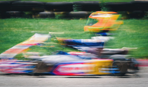 Blurred motion of car on road