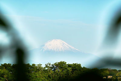 Scenic view of volcanic mountain against sky