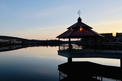 Scenic view of lake of nations during sunset