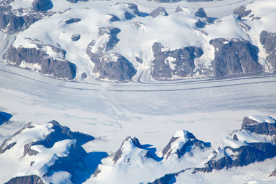 Scenic view of snow covered mountains