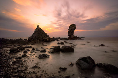 Scenic view of sea against sky during sunset