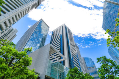 Low angle view of modern buildings against sky