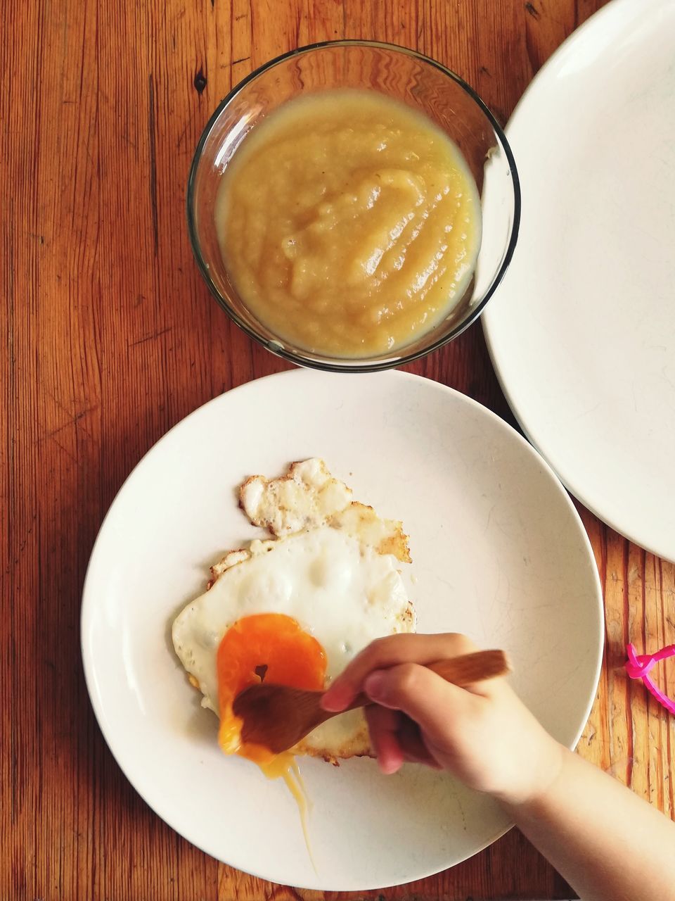 food and drink, food, table, freshness, real people, one person, healthy eating, directly above, plate, wellbeing, human body part, human hand, ready-to-eat, drink, hand, holding, meal, refreshment, indoors, breakfast, finger