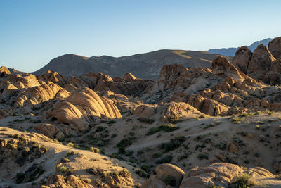 Scenic view of mountains and rocky desert against sky