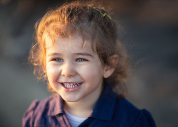 Close-up portrait of smiling boy