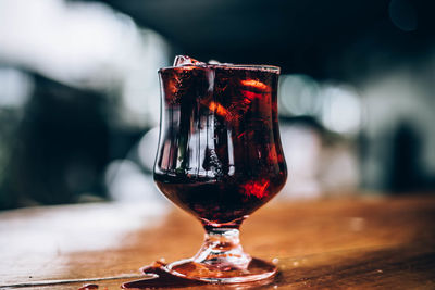 Close-up of wine glass on table