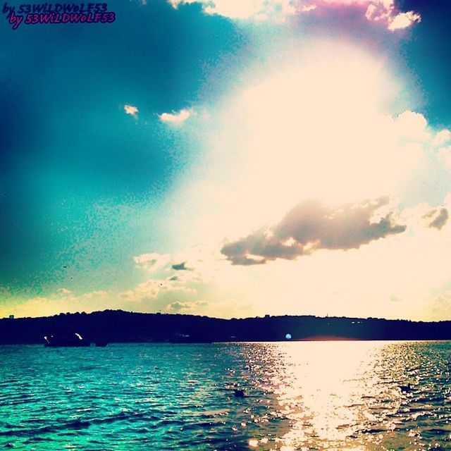 water, waterfront, sky, tranquil scene, scenics, tranquility, sea, beauty in nature, cloud - sky, silhouette, nature, rippled, sunset, cloud, reflection, blue, idyllic, lake, sunlight, river