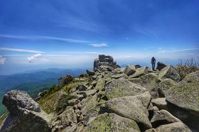 Panoramic view of rocks on mountain against sky