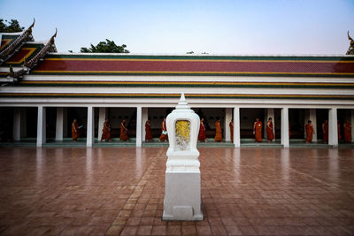 Low angle view of statue of building against clear sky